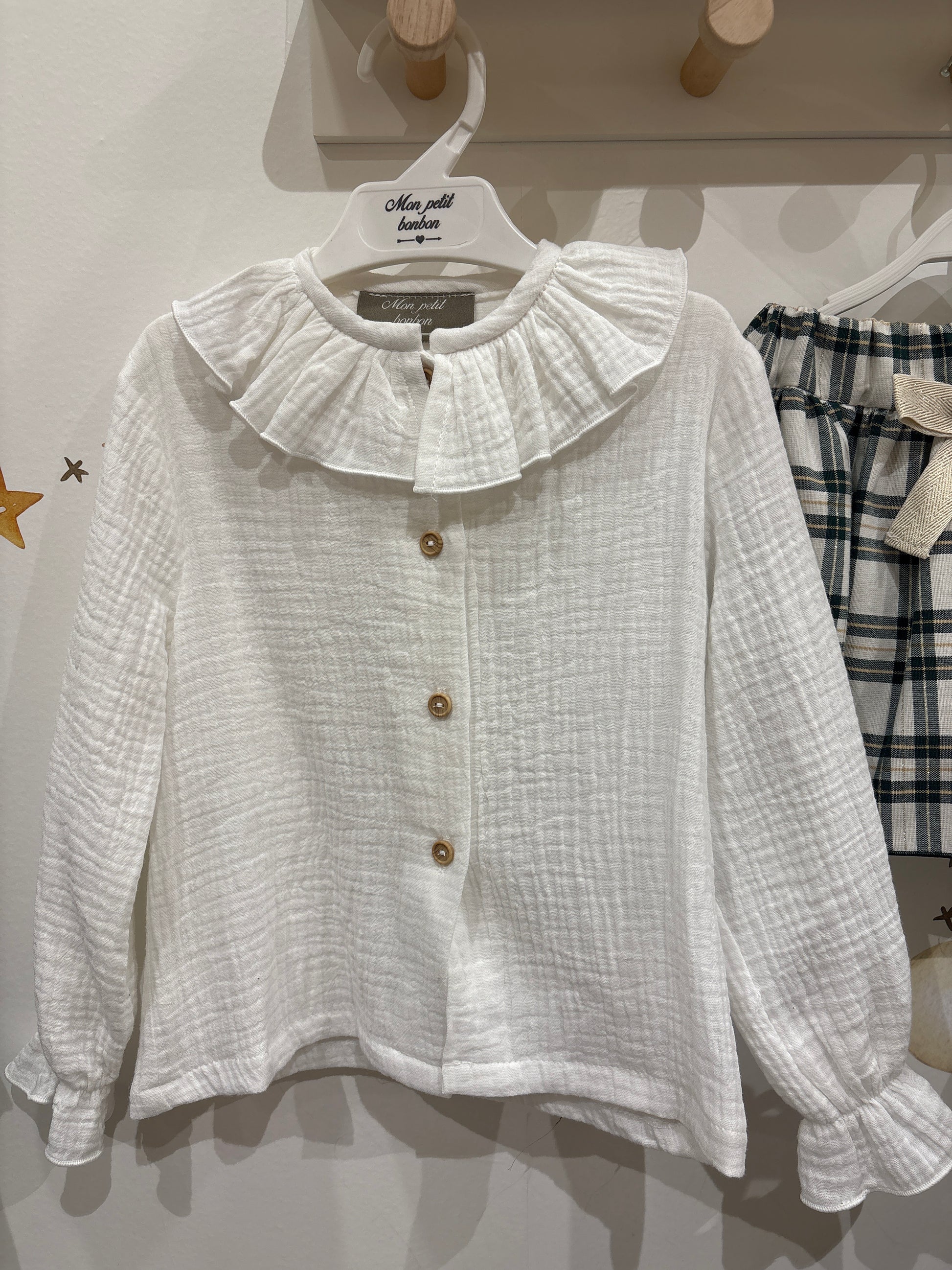 Blusa bambula cuello volante