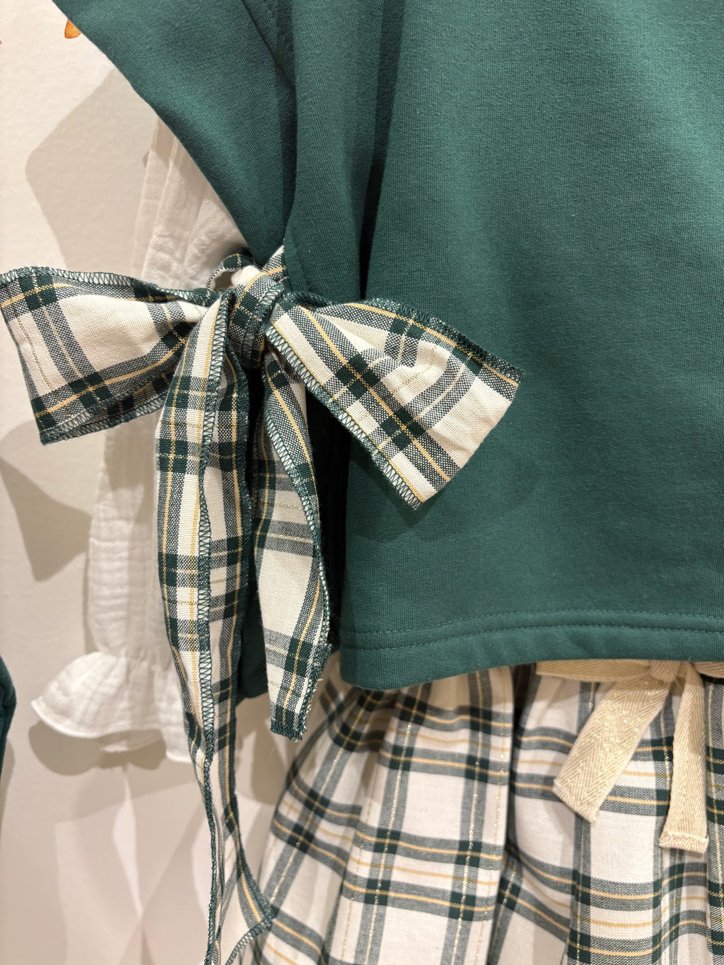 Chaleco felpa verde con lazos lurex