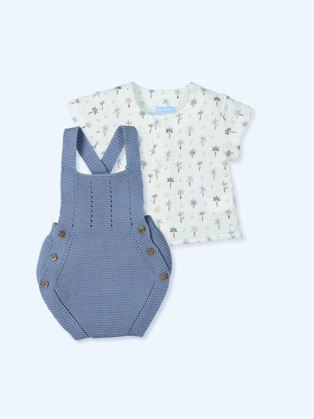 Conjunto peto de punto y camisa